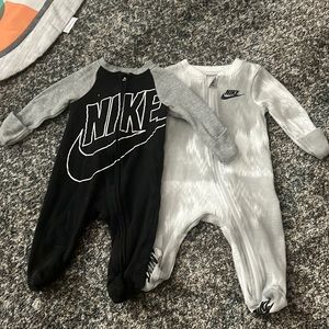 2 Nike sleepers for 0-3 months